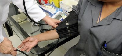 Doctor taking blood pressure